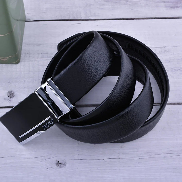 Black leather belt with sleek metal buckle, modern streetwear accessory on wood background