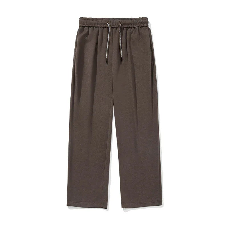 Brown wide-leg sweatpants with drawstring waist, relaxed fit, soft cotton material