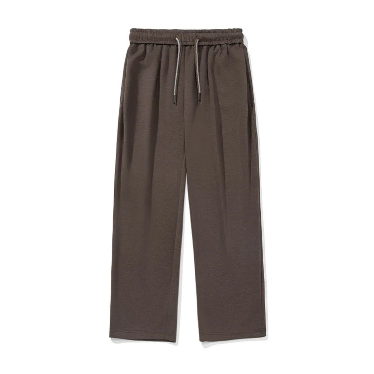 Brown wide-leg sweatpants with drawstring waist, relaxed fit, soft cotton material