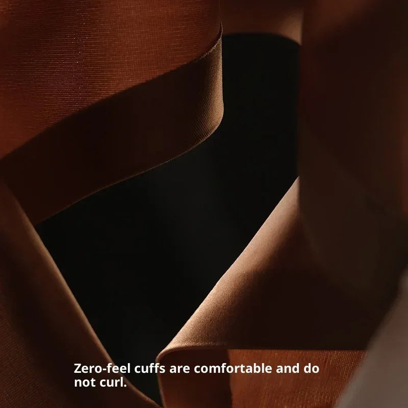 Close-up of brown zero-feel fabric cuffs with smooth texture and comfortable fit.