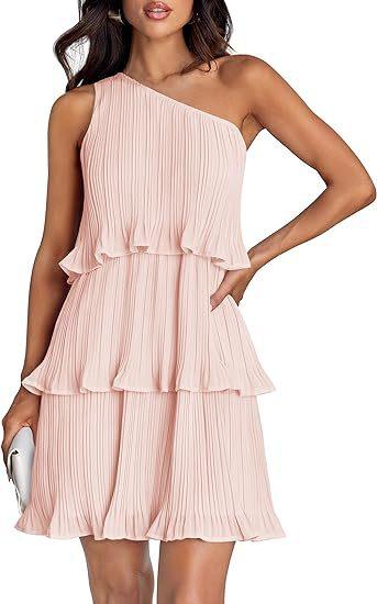Woman wearing a light pink pleated one-shoulder tiered mini dress with relaxed fit
