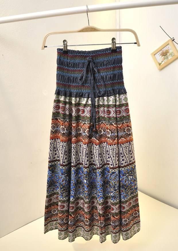 Boho style long skirt with multicolor ethnic patterns, elastic waist, and flowy fit.