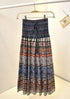 Boho style long skirt with multicolor ethnic patterns, elastic waist, and flowy fit.