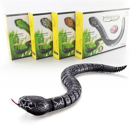 Realistic black and white remote control snake toy with segmented body and red tongue