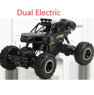 Black off-road remote control truck with large rugged tires and roll cage design