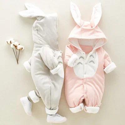 Baby romper suits in pink and grey with bunny ears, soft fleece, and loose fit.
