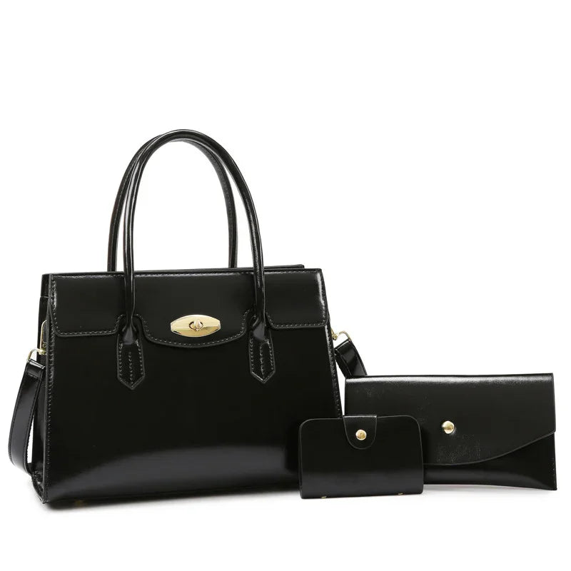 Glossy black leather handbag set with gold-tone hardware, structured and elegant fit