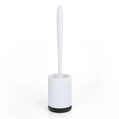 Modern white toilet brush with sleek plastic handle and minimalist holder on white background.