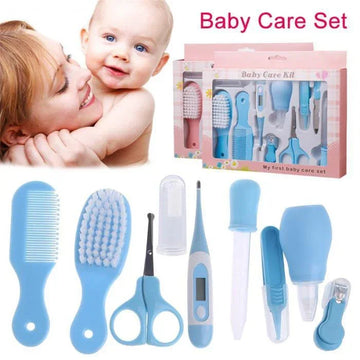 Blue baby care kit with comb, brush, scissors, thermometer, and grooming tools