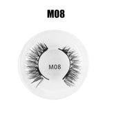 Voluminous black faux mink false eyelashes in round plastic case, style M08.