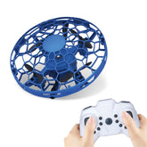 Blue circular mini drone with hexagonal cage design and white handheld remote control