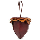 Brown and tan faux leather acorn-shaped handbag with layered petal detailing and strap