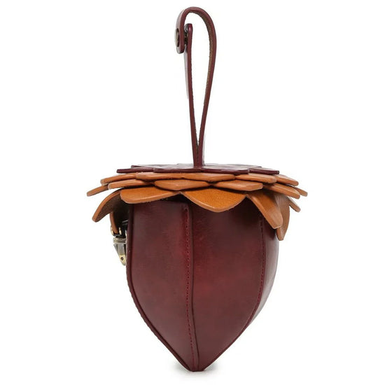Brown and tan faux leather acorn-shaped handbag with layered petal detailing and strap