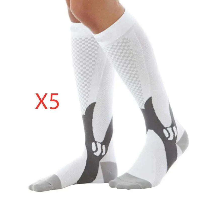 White and black knee-high compression socks with geometric patterns and snug athletic fit