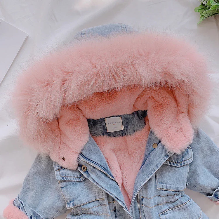 Light blue denim jacket with pink faux fur lining and hood, oversized streetwear style
