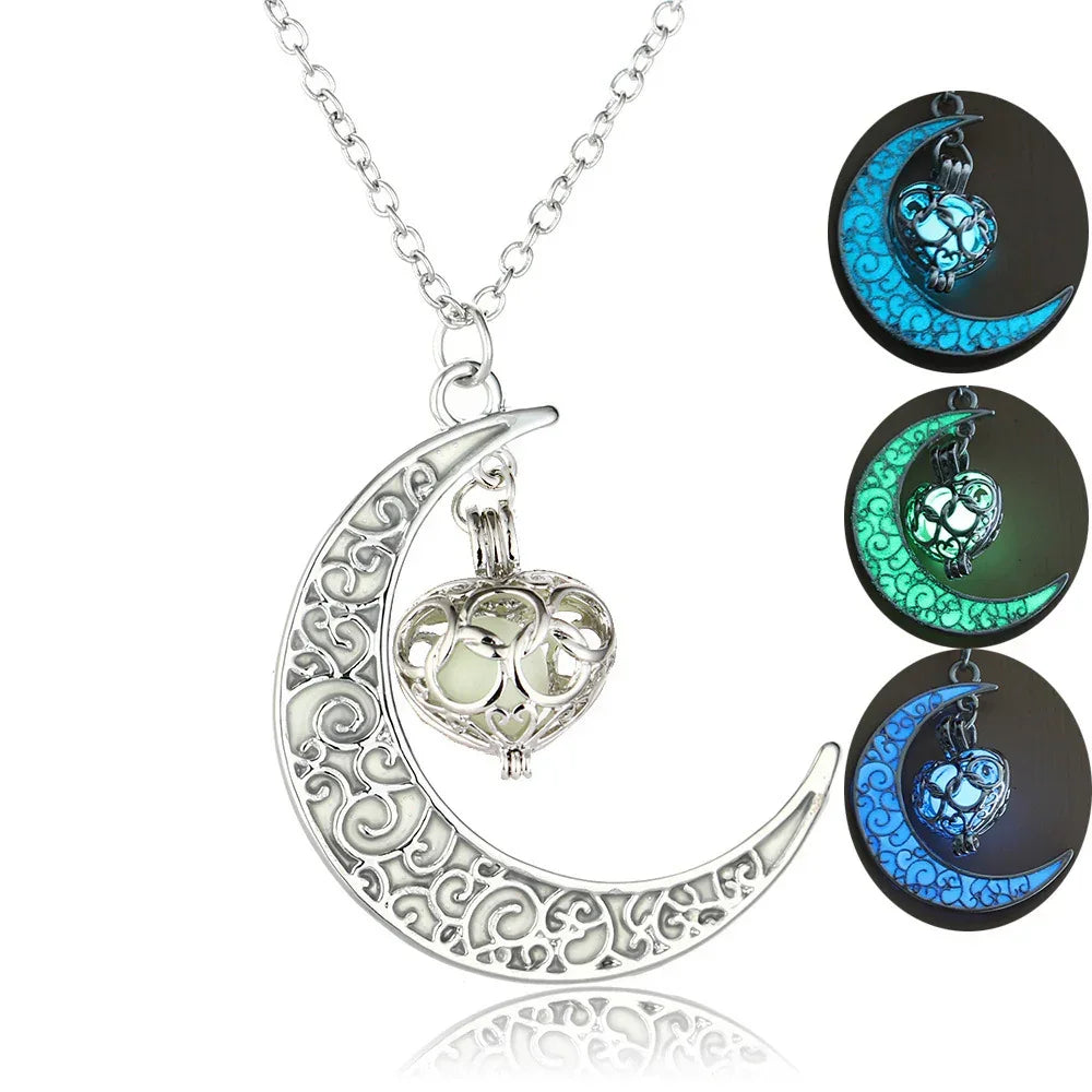 Silver crescent moon necklace with filigree heart pendant, glows blue and green in dark, streetwear accessory