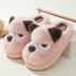Plush pink dog slippers with brown ears, fuzzy texture, and slip-on design