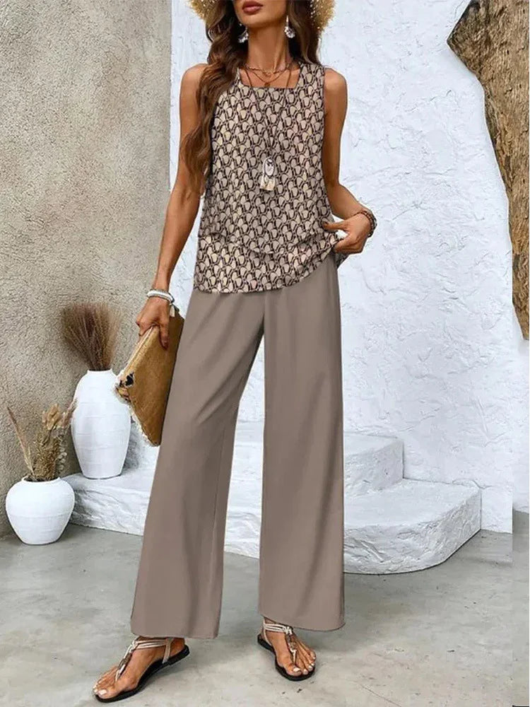 Woman wearing sleeveless geometric print top and wide-leg taupe pants, relaxed fit streetwear