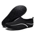 Black slip-on mesh water shoes with white accents and flexible rubber sole