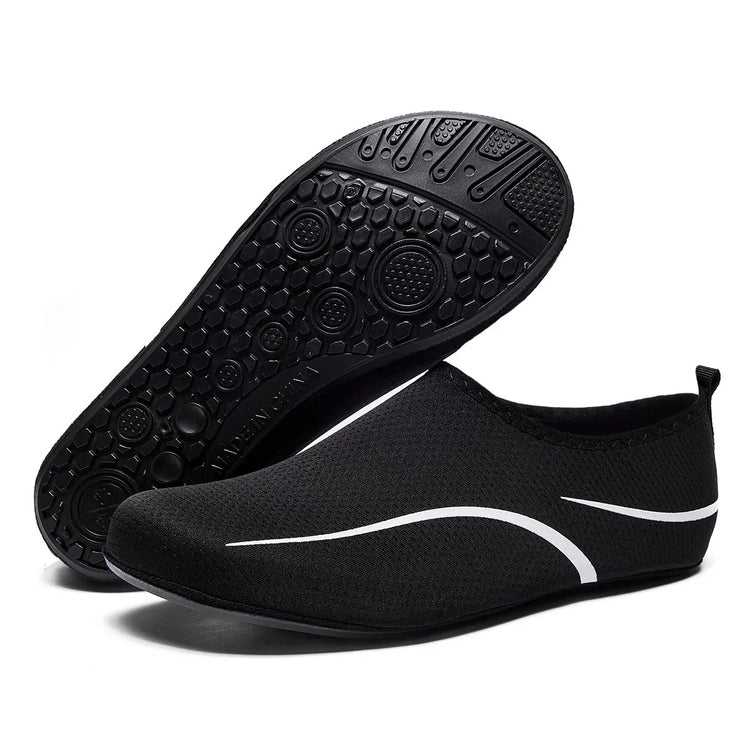 Black slip-on mesh water shoes with white accents and flexible rubber sole