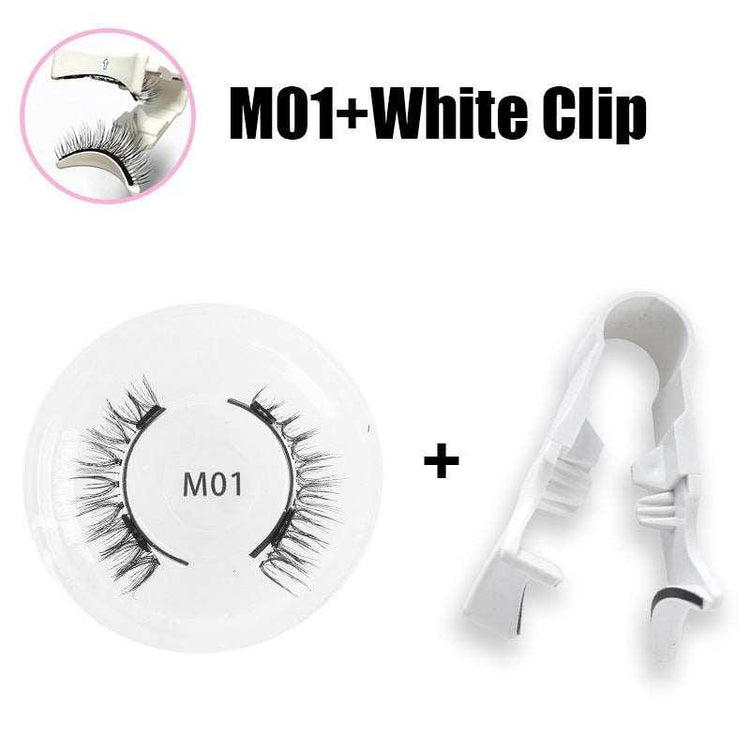 Pair of black synthetic false eyelashes with white plastic application clip