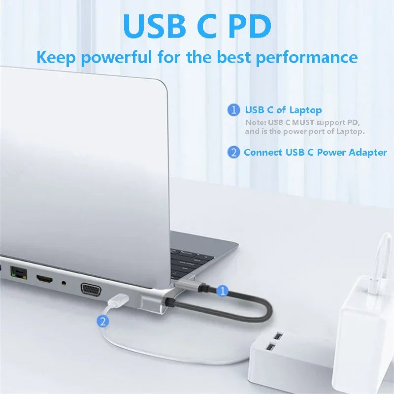 Silver laptop connected to USB C power adapter, showing cable plugged into USB C port