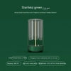 Modern green LED lamp with glass cover, warm yellow light, and cylindrical design