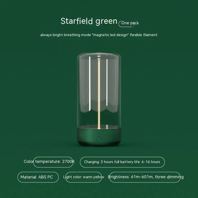Modern green LED lamp with glass cover, warm yellow light, and cylindrical design