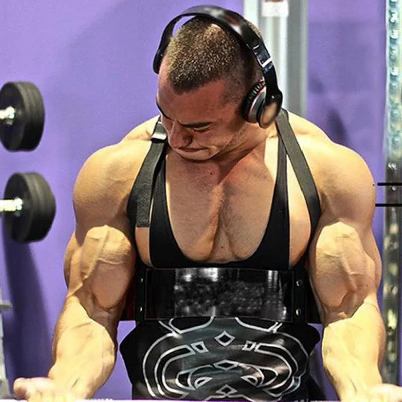 Muscular man wearing a black sleeveless gym tank top with wide straps, fitted style