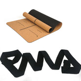 Cork and black yoga mat with guide lines, paired with a black stretch resistance band.