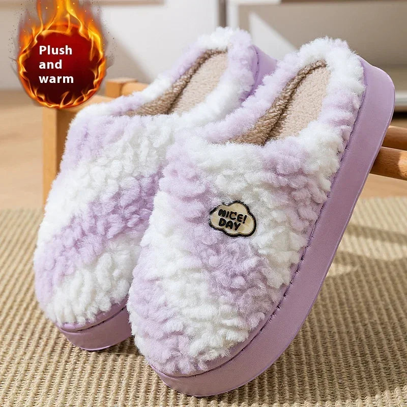 Plush purple and white fuzzy slippers with thick sole and cozy fit, soft indoor footwear