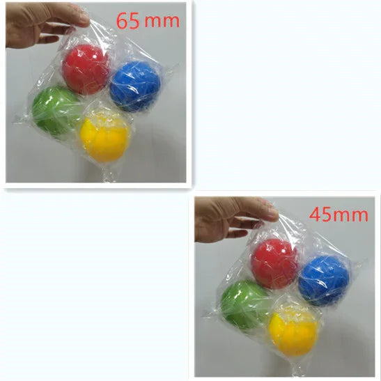 Hand holding sets of red, blue, green, and yellow plastic balls in 65mm and 45mm sizes.