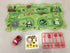 Colorful animal-themed playmat with winding green tracks, red toy car, traffic signs, and stickers