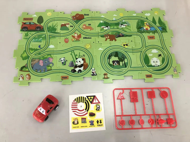 Colorful animal-themed playmat with winding green tracks, red toy car, traffic signs, and stickers