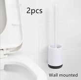 Minimalist white wall-mounted toilet brush set with holder in modern bathroom