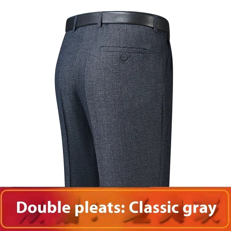 Classic gray dress pants with double pleats, tailored fit, back pocket and belt.