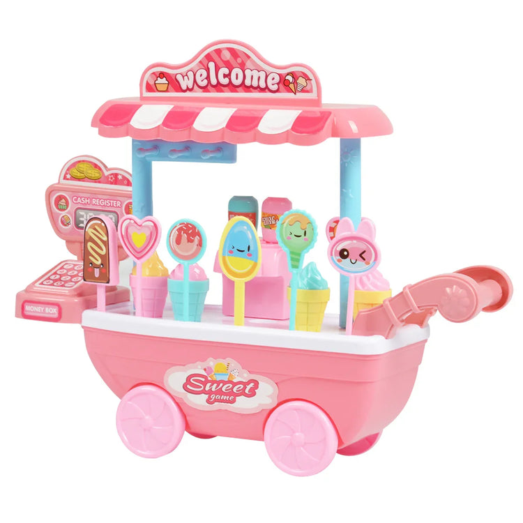 Pink toy ice cream cart with colorful ice cream cones and popsicles, play cash register, and wheels.