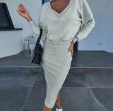 Light grey knit bodycon midi dress with long sleeves and V-neck, casual street style