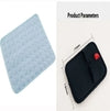 Light blue quilted cushion pad and black neoprene case with red tab, 170x130mm dimensions shown