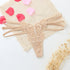 Beige lace butterfly thong with multiple straps, delicate floral embroidery, feminine fit