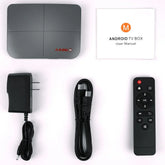 Grey Android TV box set with remote, HDMI cable, power adapter, and user manual on white background