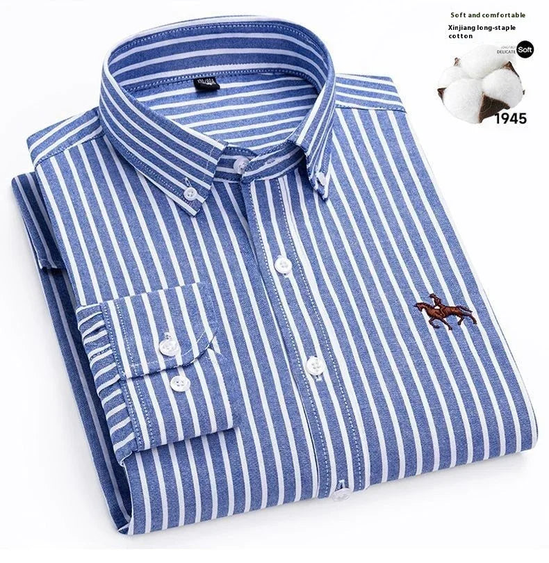 Men's blue and white vertical striped cotton dress shirt, slim fit, folded neatly.