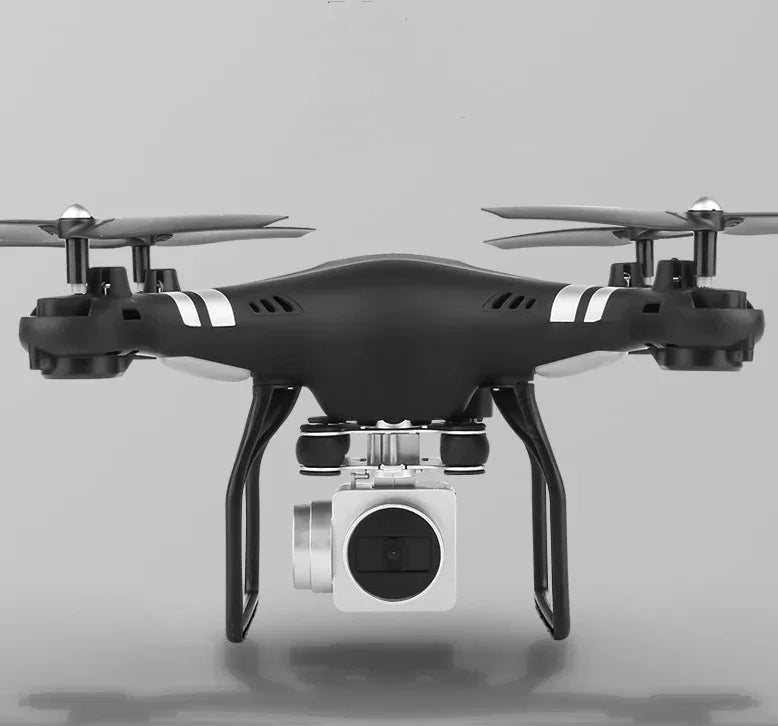 Black quadcopter drone with camera, silver accents, and modern aerodynamic design