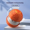 Orange textured smart rolling ball with replaceable rotating housing on a light background.