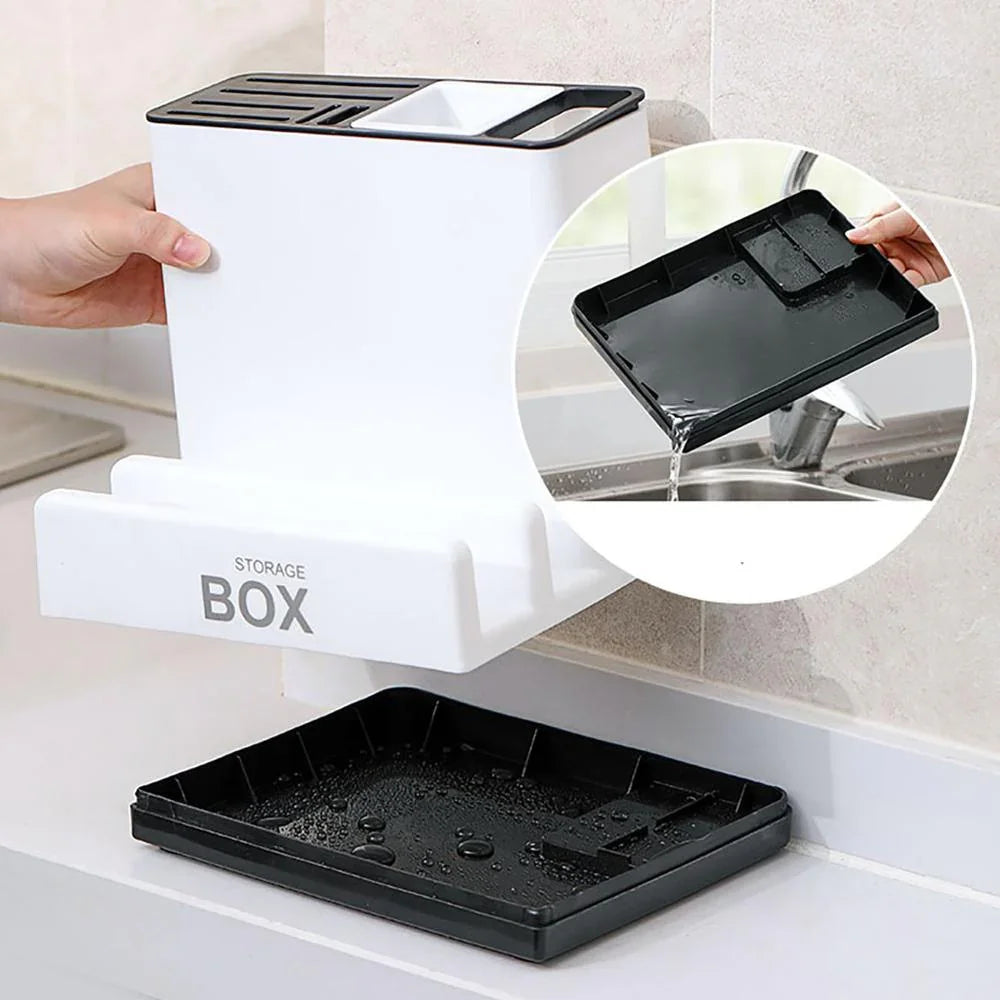 White plastic kitchen storage box with removable black drainage tray and utensil slots.