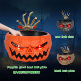 Halloween-themed pumpkin and skull fruit bowls with red LED eyes and skeleton hand design.