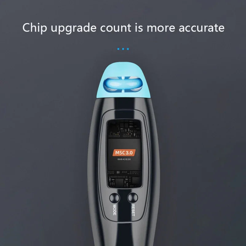 Close-up of a black electronic device with blue tip, digital display, and control buttons on a dark background.