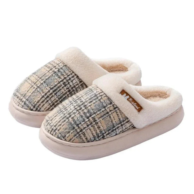 Plaid winter slippers with beige faux fur lining, soft sole, and cozy slip-on fit.