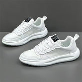 White mesh and leather sneakers with chunky sole, lace-up, modern streetwear style