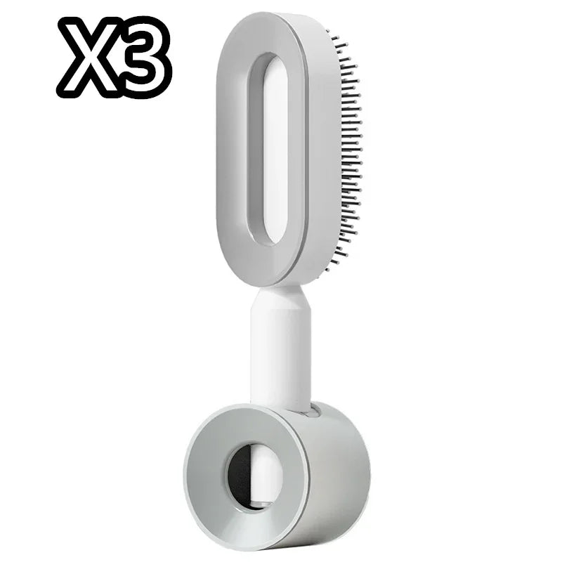 Modern white pet grooming brush with ergonomic handle and fine bristles, set of three.